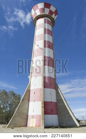 Irrigation Water Tank Over Blue Sky. Concrete Tower Made For Store Irrigation Water, Vegas Bajas Del