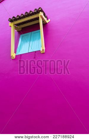 Closed Window Shutters In A Pink Wall