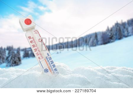 Thermometer registering temperature below zero outdoor