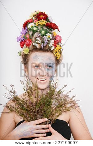 A Young Womaa Young Woman With Flowers On Her Head And Hands. Spring Image With Flowers. Man With A 