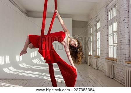 Girl Training On Aerial Silks