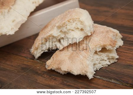 Pita Bread On Dark Rustic Wood Table. Georgean Traditional Bread. Bakerry Food Concept.