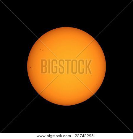 The Sun Seen With Telescope From Planet Earth, With Sunspots Visible As Dark Spots Compared To Surro
