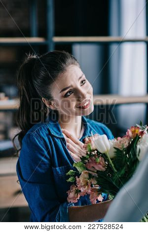 Young Woman Pretending To Receive Flowers From Layman Doll, Perfect Relationship Dream Concept