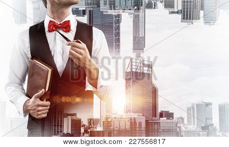 Double Exposure Of Confident And Young Businessman In Smart-casual Wear Smoking Pipe And Two Modern 