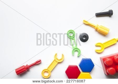 Kids Educational Developing Toys Frame On White Background. Top View. Flat Lay. Copy Space For Text.