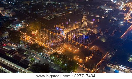 Aerial View From Drone: Wat Phra Sri Rattana Mahathat With Lighting On Night, The Famous Public Temp