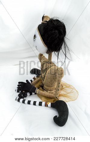 Creepy Steampunk Rag Doll Posed In A Sitting, Kneeling Position Looking Left. Lifesize Doll On A Gru