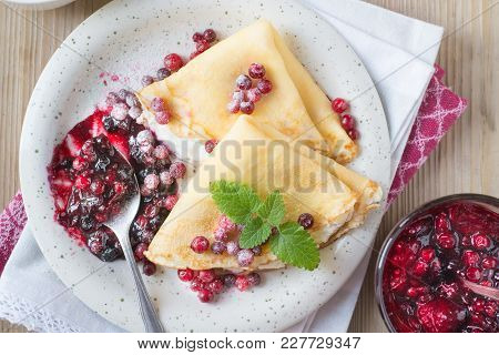 Pancakes With Creem Cheese And Lingonberries And Tea