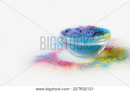 Indian Holi Festival. Mix Of Blue And Pink Colours In Bowl On White Background. With Text Space