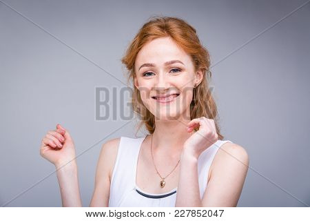 Closeup Portrait Young, Beautiful Business Woman, Student With Lred, Curly Hair And Freckles On Face