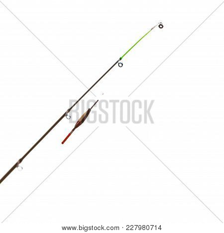 Spinning Sport Equipment Concept. Person Holding Fishing Rod With Float And Waggler With Line.