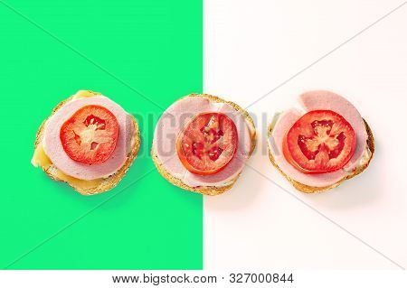 Three Open Sandwiches Made Of One Slice Of Bread With Sesame Seeds In Crust, And Slices Of Cheese, C