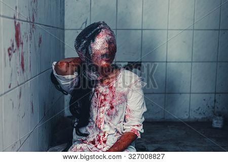 Horror Scence Of Woman Cover The Plastic Bag In Head In Toilet
 At Abandoned House.ghost Women Wear 