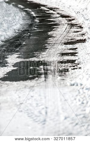 Country Road At Winter Season, Black Ice And Snow On The Top, Accident Risk And Danger, Copyspace