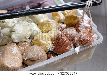 Bags With Different Spices In The Box. Homemade Spices: Turmeric, Herbs, Adjika. Georgian Spices For