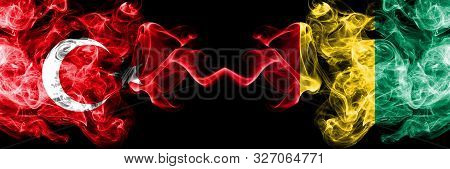 Turkey Vs Guinea, Guinean Smoke Flags Placed Side By Side. Thick Colored Silky Smoke Flags Of Turkis