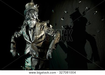 Professional Mime Actor Making Surprised Facial Expression And Looking At Butterflies, Made From Pap