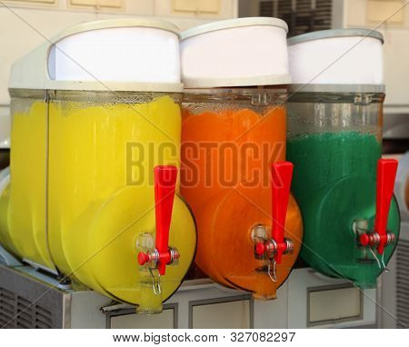 Dispenser With Many Ice With Colorful Sweety Syrup