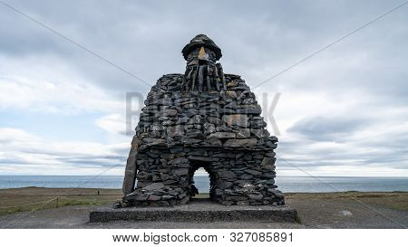 Arnarstapi, Iceland - August 2019: Stone Monument To Mythological Hero Bardur Snaefellsas