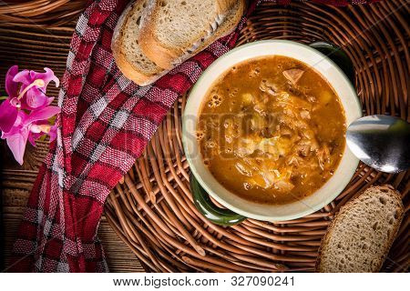Traditional Russian Sour Cabbage Soup On Wicker Napkin. Top View.