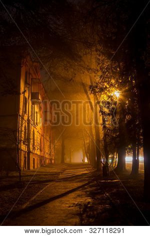 A Beautiful Footpath In The Evening In The City During The Fog, Foggy Evening