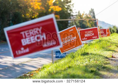 North Vancouver, Bc, Canada - Oct 10, 2019: Mp Candidate Signs Beside The Road Rallying For Voter Su