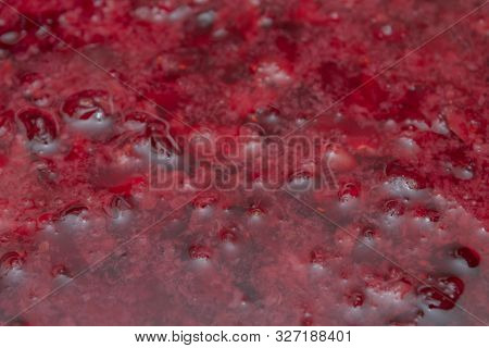 Crushed Red Cranberry Filled With Alcohol Before Cooking Tinctures