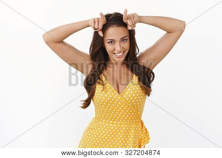 Playful Cute Brunette Girl Making Goofy Grimace, Fooling Around, Show Bull Or Devil Horns, Smiling J