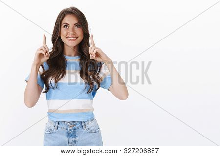 Lucky Hopeful Good-looking Female In T-shrit And Jeans, Smiling Upbeat Excited Achieve Goal Finally 