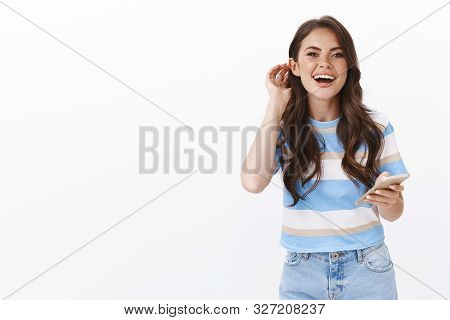 Carefree Modern Glamour Woman With Curly Haircut, Put Stran Behind Ear Cute, Laughing Joyfully, Hold
