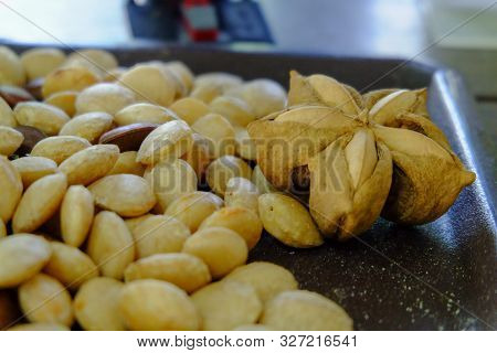 Sacha Inchi Peanuts Or Inca Seeds On A Tray. Sacha Inchi Has Cosmetic Qualities.