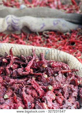 Cloese-up Of Dried Red Chillies In A Sack,mysuru,india.