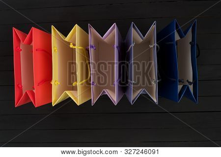 Five Empty Multi-colored Shopping Bags. Top View. No Shopping