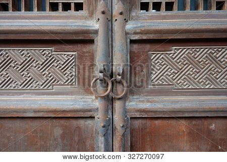 Traditional Chinese Residences Interior Wooden Door And Metal Door Ring In Tianshui Folk Arts Museum