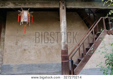 Traditional Chinese Residences Architecture Wooden Pillar And Ladder In Tianshui Folk Arts Museum Hu