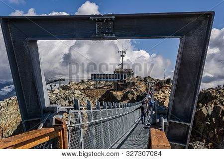 Whistler, Canada - August 25, 2019: People On The Cloudraker Skybridge Suspension Bridge.