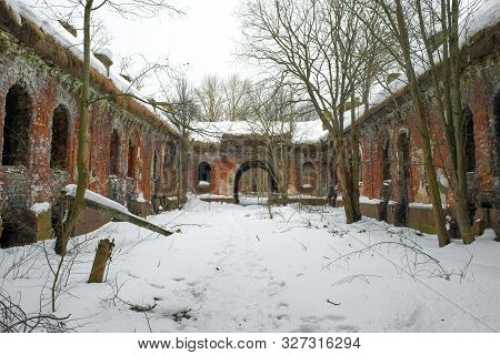 The Ruins Of The Old Barracks About The Artillery Fort , Cloudy February Day. Kronshtad, Russia