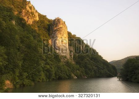 Decebal Head Sculpted In Rock. Danube Gorges (cazanele Dunarii) Romania.