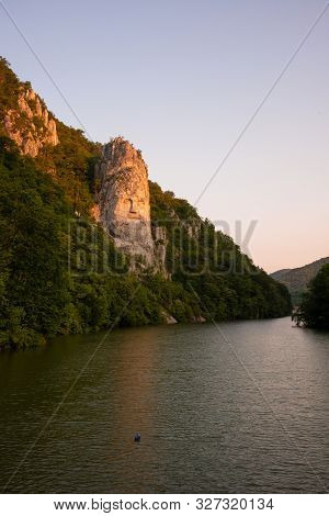 Decebal Head Sculpted In Rock. Danube Gorges (cazanele Dunarii) Romania.