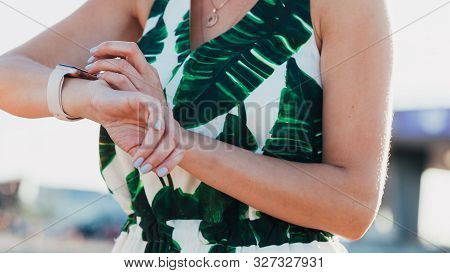 Female Touching Her Smartwatch. Detail View Tech Gear.