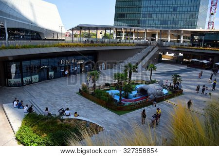 Milan, Italy - 07.14.2019: Entrance Of The Citylife Shopping Center At The Bottom Of The Three Tower