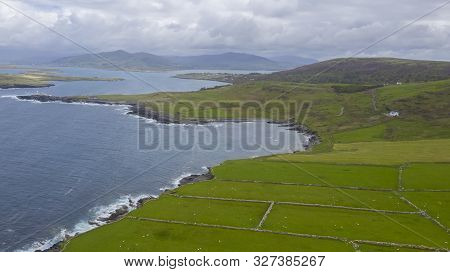 Beautiful View Of Valentia Island Lighthouse At Cromwell Point. Scenic Irish Countyside On Sunny Sum