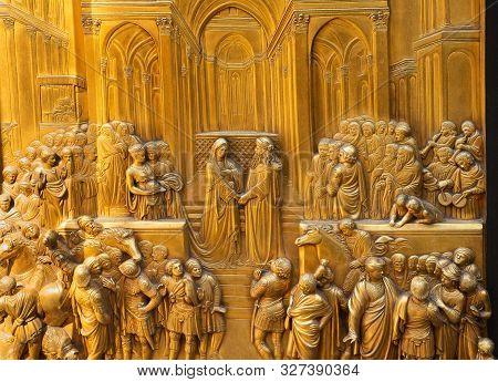 Florence, Italy - May 31, 2019: King Solomon Meets The Queen Of Sheba - One Of Ten Bronze Panels On 