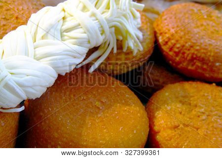 National Homemade Circassian Cheese, On The Table, Close-up. White Cheese Pigtail