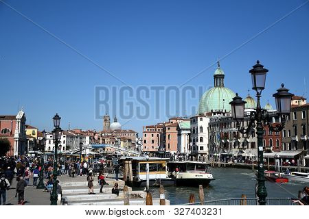 Venice, Italy, 04.19.2019: San Simeone Piccolo Church And The Ponte Degli Scalzi, Scalzi Bridge, 