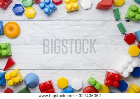 Kids Educational Developing Toys Frame On White Background. Top View. Flat Lay. Copy Space For Text