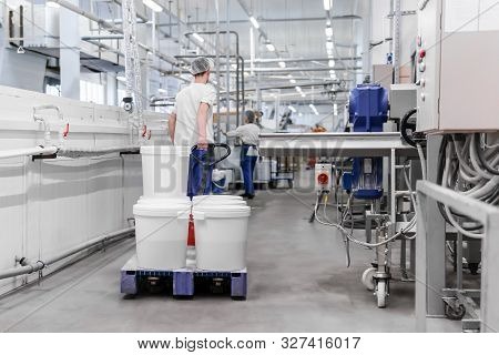 Work In The Workshop Of A Modern Automated Confectionery Factory With Conveyor Lines