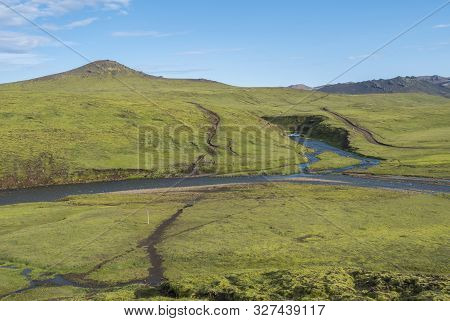 Group Of Hikers Preparing To Ford Across The Blue River Stream At Laugavegur Hiking Trail. Landscape