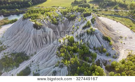 Sand Hills Of Quarry With A Pond And Abandoned Prison In Rummu Estonia Europe. Flooded Houses Of For
